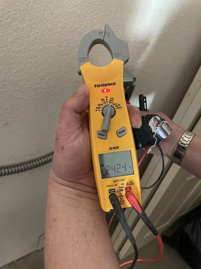 Voltage testing with clamp meter during Circuit Breaker Repair in Grapevine